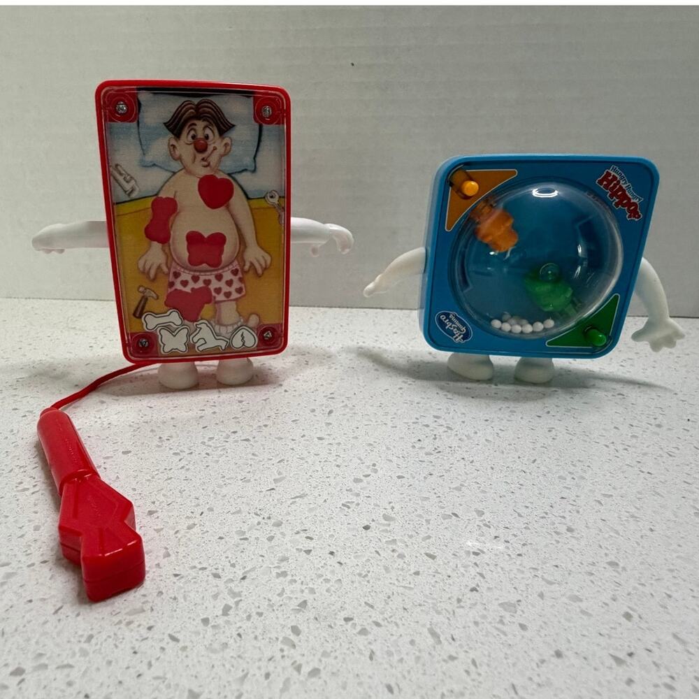 Hasbro Gaming promotion miniature versions Operation game Hungry Hippos